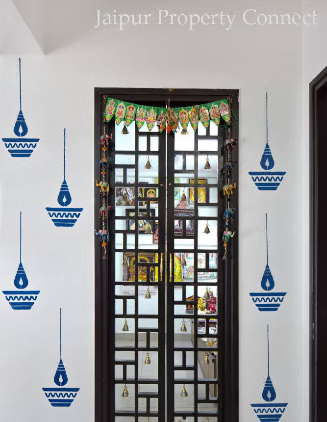 Bells are a nice accessory to style your mandir doors with
