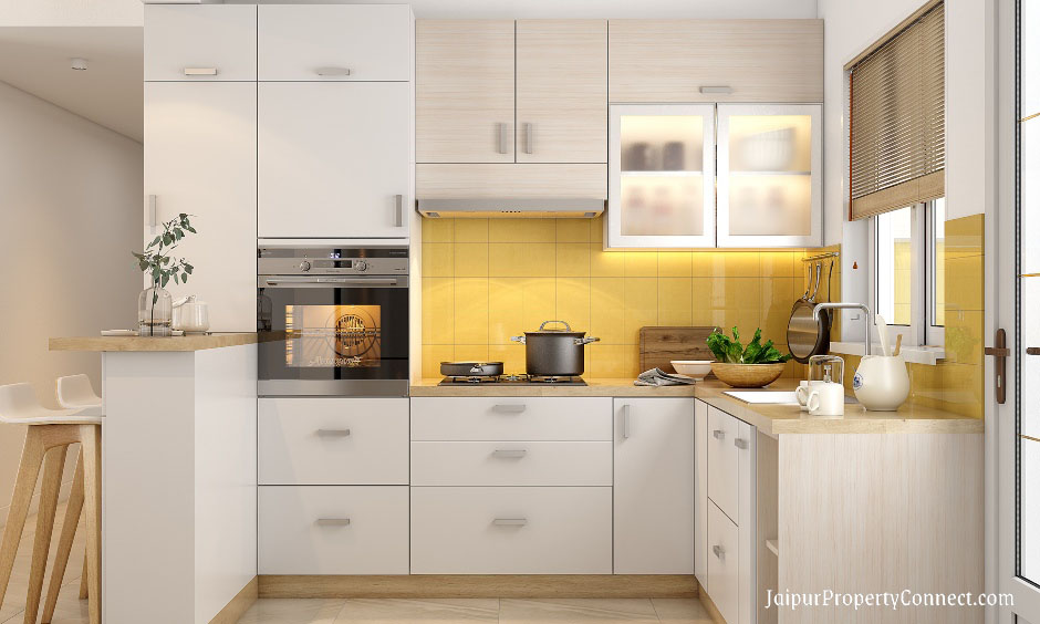small-2bhk-kitchen-designed-with-built-in-microwave