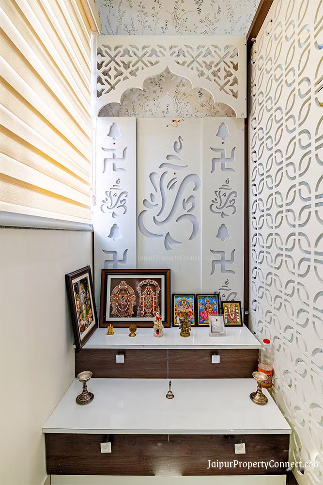 white-and-wood-pooja-room-with-jaali-wall-partition-and-cnc-mdf-back-panel